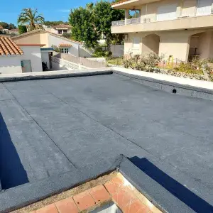 Impermeabilización con sistema bicapa acabado mineral autoprotegida